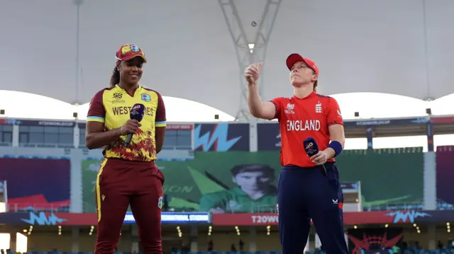 Heather Knight tosses the coin