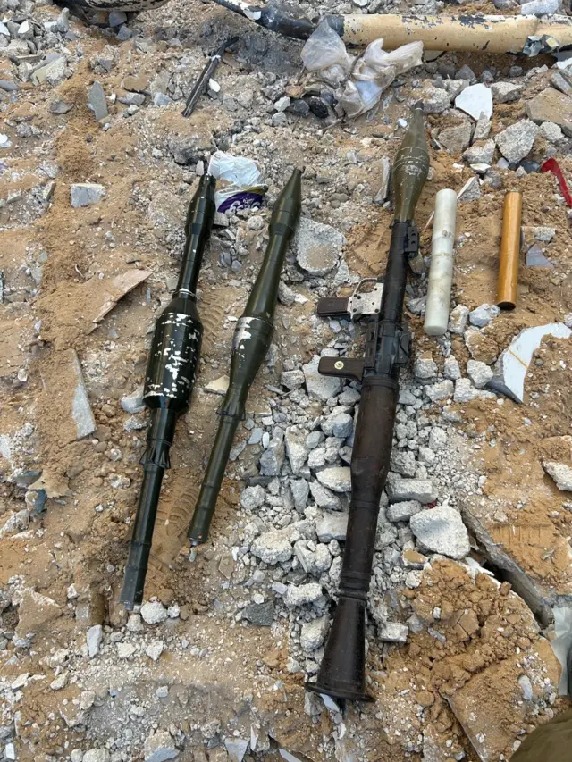 Two rockets and what appears to be a rocket launched laid out on the ground after IDF operation in Jabalia