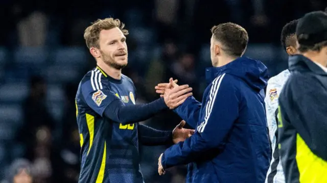 GLASGOW, SCOTLAND - OCTOBER 15: Scotland's ANicky Devlin (L) and Ryan Christie at full time during a UEFA Nations League Group A1 match between Scotland and Portugal at Hampden Park, on October, 15, 2024, in Glasgow, Scotland. (Photo by Alan Harvey / SNS Group)