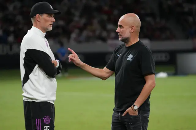 Thomas Tuchel talks to Pep Guardiola