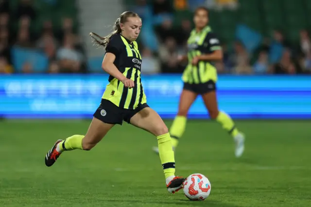 Codie Thomas playing for Man City