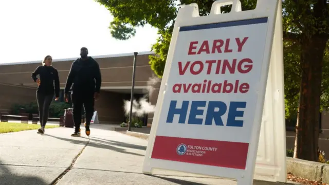 A sign directs voters in Atlanta, Georgia to a polling site at Atlanta Metropolitan College