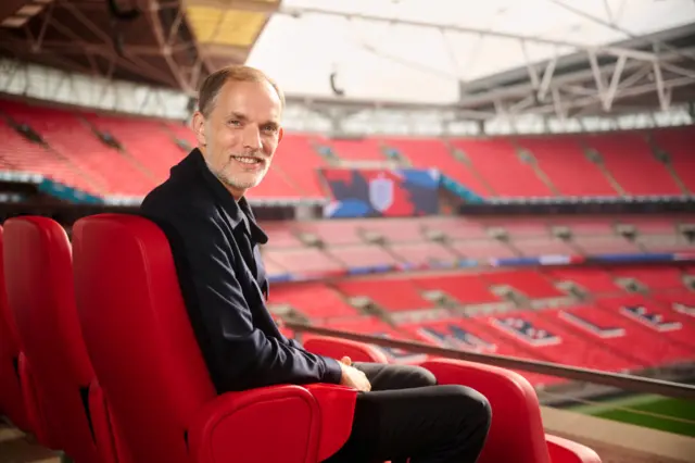 Thomas Tuchel sitting down at Wembley