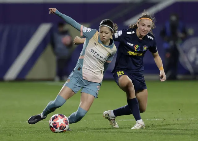 Yui Hasegawa with the ball against St Polten