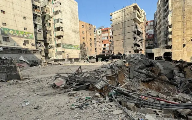 Rubble lies at a damaged site in the aftermath of Israeli strikes on Beirut's southern suburbs