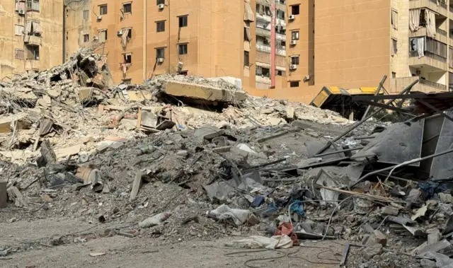 Debris lies at a damaged site in the aftermath of Israeli strikes on Beirut's southern suburbs