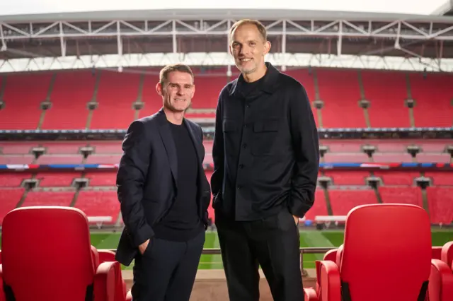 Thomas Tuchel stands with assistant manager Anthony Barry at Wembley