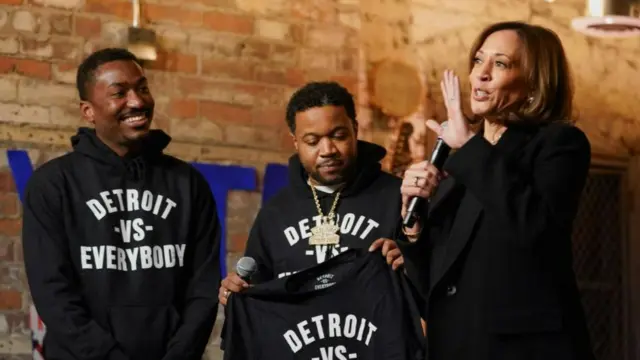 Harris with supporters wearing hoodies that say Detroit Vs Everybody