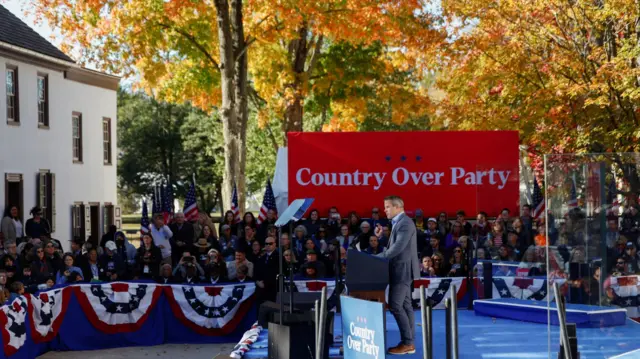 Former Republican Congressman Adam Kinzinger speaks to Harris supporters at a Wednesday campaign rally in Pennsylvania