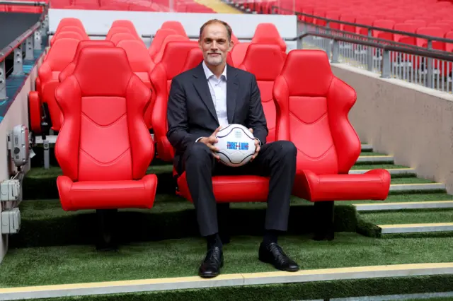 Thomas Tuchel sits in the Wembley dugout