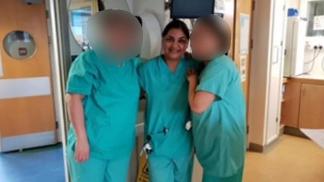 A picture of Tanyar Nasir in her nurse's uniform, with two other nurses with their faces blurred