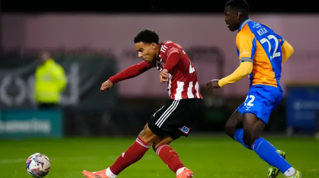 Kamari Doyle scores the opening goal of the game for Exeter against Shrewsbury