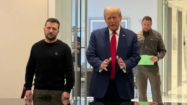 Ukraine's President Volodymyr Zelensky listens as Donald Trump speaks at a meeting in September