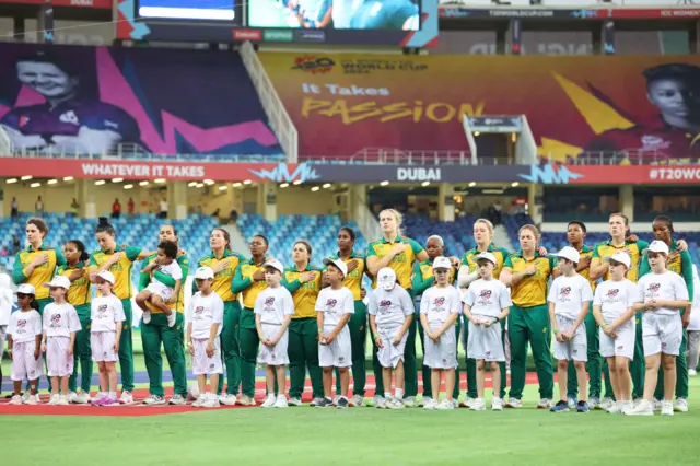 South Africa line up for the national anthems