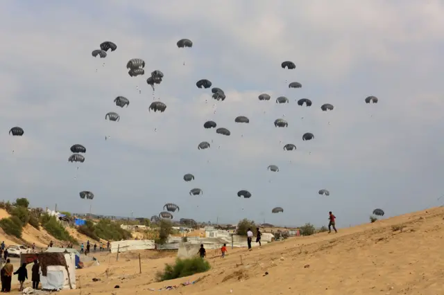 Humanitarian aid packages dropped over Gaza.