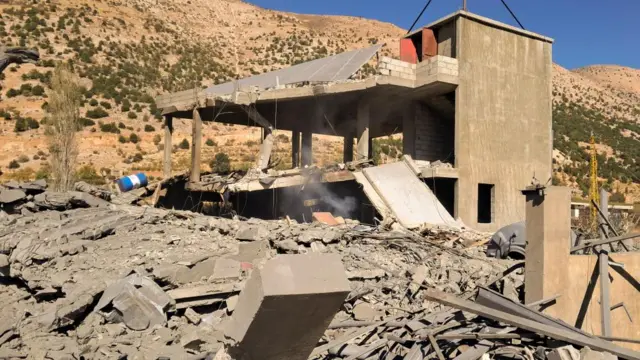 A view shows a site damaged by an Israeli strike in Yammouneh, in Baalbek district, Lebanon