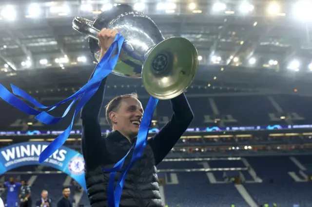 Thomas Tuchel lifting the Champions League trophy in 2021