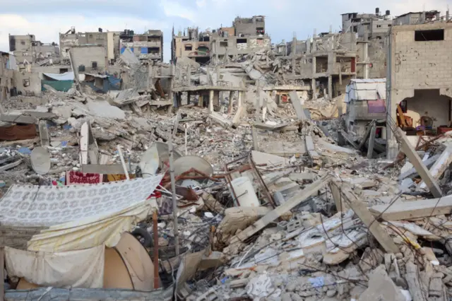 A picture shows destroyed buildings in Khan Yunis in the southern Gaza Strip on October 17, 2024