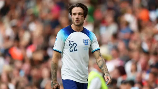 Liam Payne wearing England football kit with the number 22 shirt during Soccer Aid