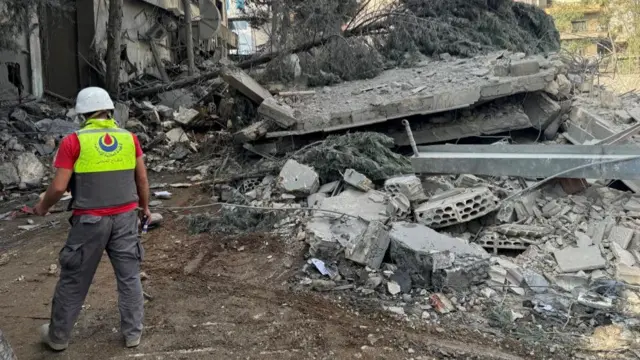 Rescuers in Nabatieh yesterday