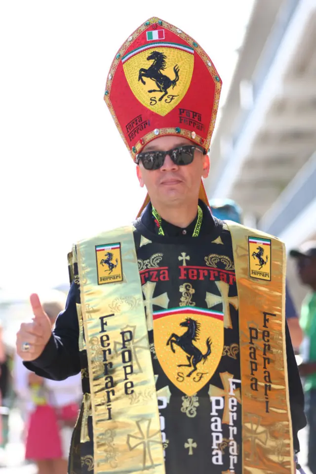 A Ferrari fan dressed as the Pope