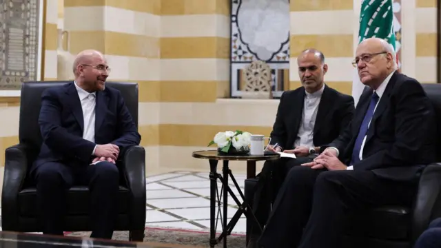 Picture showing Iranian Parliament Speaker Mohammad Baqer Qalibaf (l) meeting Lebanon's caretaker Prime Minister Najib Mikati (r) in Beirut on 12 October