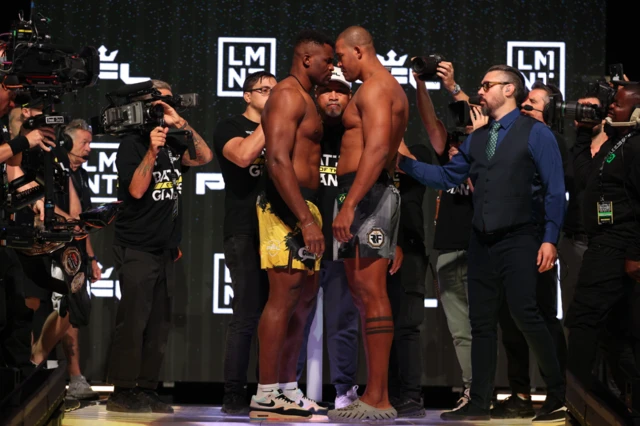 Francis Ngannou and Renan Ferreira are separated at a weigh-in