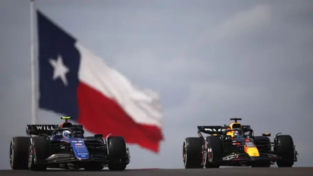 The Williams of Franco Colapinto and Red Bull of Max Verstappen alongside each other with the Texas flag in the background during US Grand Prix first practice