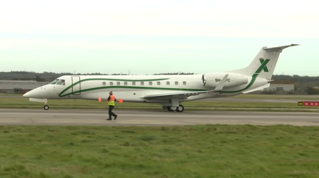 salmond plane touches down