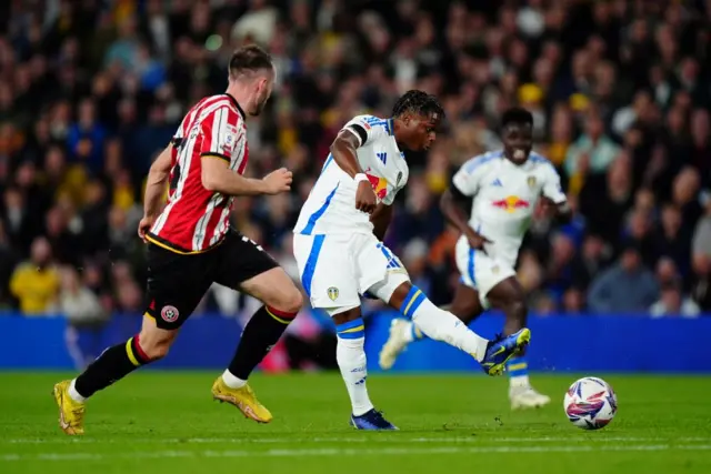 Leeds United's Largie Ramazani (right) shoots at goal