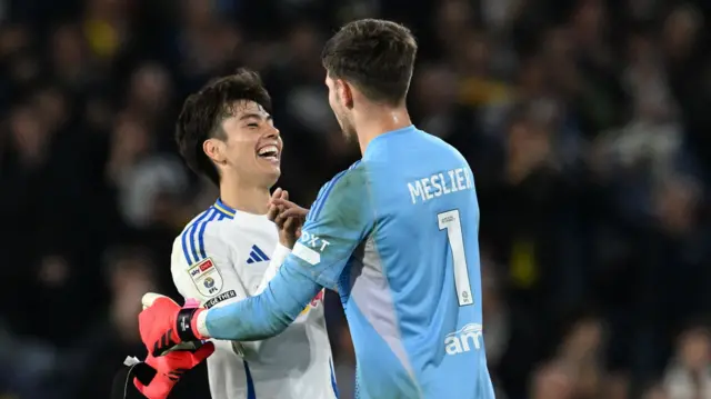 Ao Tanaka and Illan Meslier celebrate