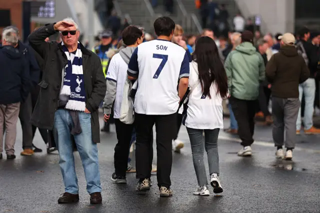 A fan wearing a replica shirt of Son Heung-Min of Tottenham Hotspur is seen outside