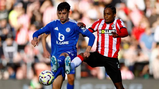 Southampton's Kyle Walker-Peters in action with Leicester City's Facundo Buonanotte