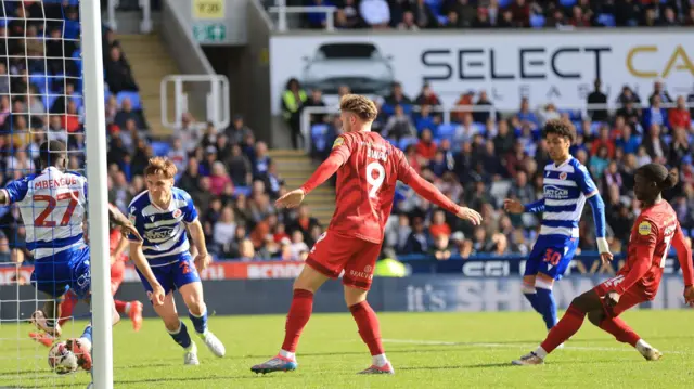 Reading Amadou Mbengue denies Crawley's Junior Quitirna with a goal-saving block