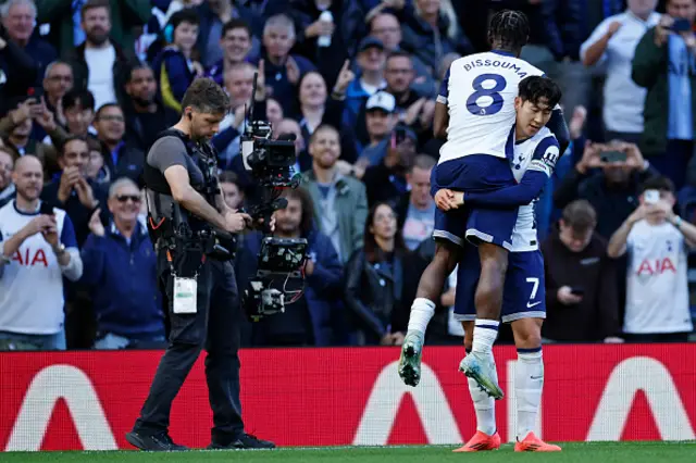 Yves Bissouma jumps into the arms of Son Heung-Min