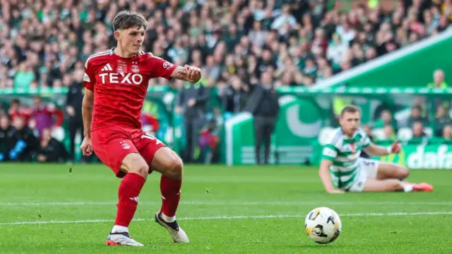 LASGOW, SCOTLAND - OCTOBER 19: Aberdeen's Leighton Clarkson has a shot cleared off the line by Celtic's Alex Valle during a William Hill Premiership match between Celtic and Aberdeen at Celtic Park, on October 19, 2024, in Glasgow, Scotland. (Photo by Ross MacDonald / SNS Group)