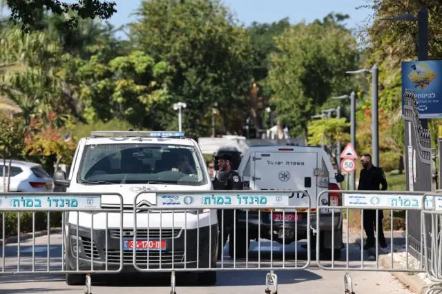Israeli police at the scene targeted by unmanned aerial vehicle (UAV) fired from Lebanon