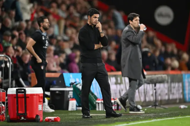 Arteta watches on from the sideline deep in thought