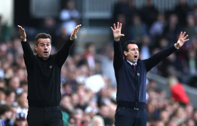 Marco Silva, Manager of Fulham, reacts alongside Unai Emery