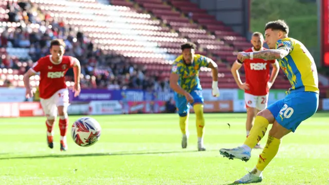 Louie Barry scores from the spot for Stockport