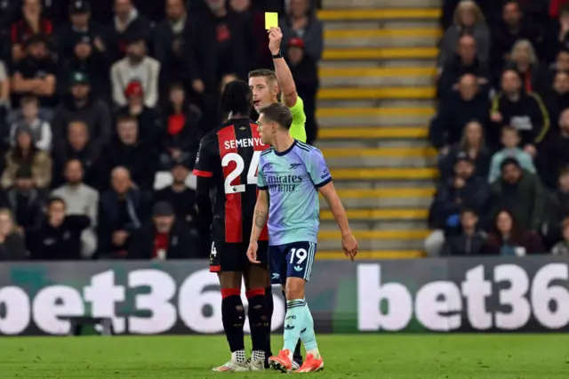 Semenyo is shown a yellow card