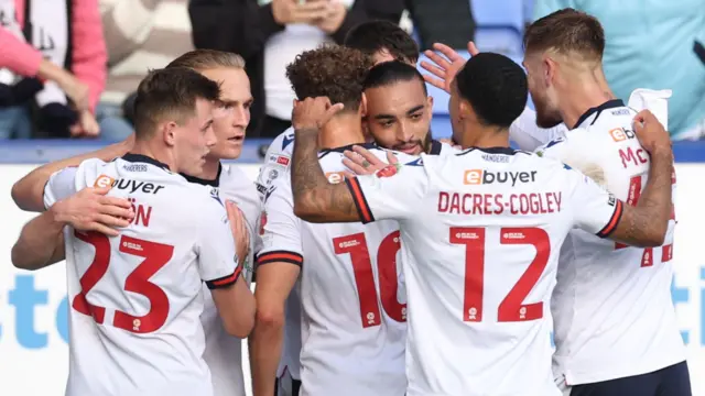 Bolton celebrate their win over Burton