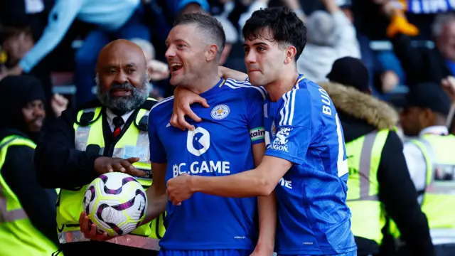 Leicester City's Jamie Vardy and Facundo Buonanotte celebrate after Jordan Ayew scores their third goal