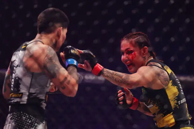 Blood pours from Cris Cyborg's face