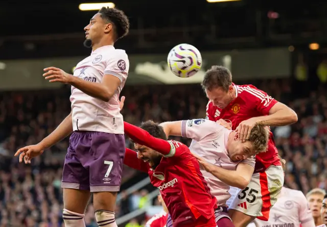 Mason Mount of Manchester United and Jonny Evans of Manchester United in action