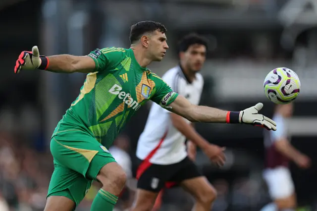 Emiliano Martinez kicks the ball