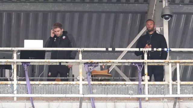 Bolton manager Ian Evatt watches their game against Burton from the gantry of the Toughsheet Community Stadium