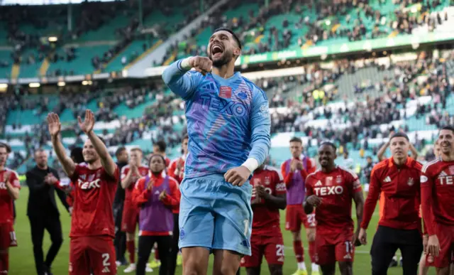 Goalkeeper Dimitar Mitov leads the Aberdeen celebrations