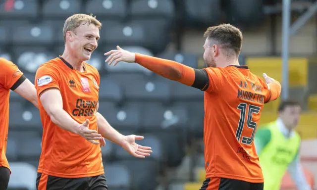 Sam Dalby and Glenn Middleton celebrate the opening goal