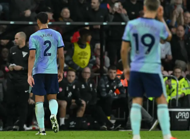 Trossard watches on as Saliba leaves the pitch